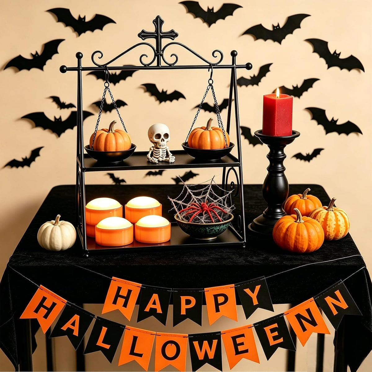 Orange LED pumpkin lights on a Halloween display shelf